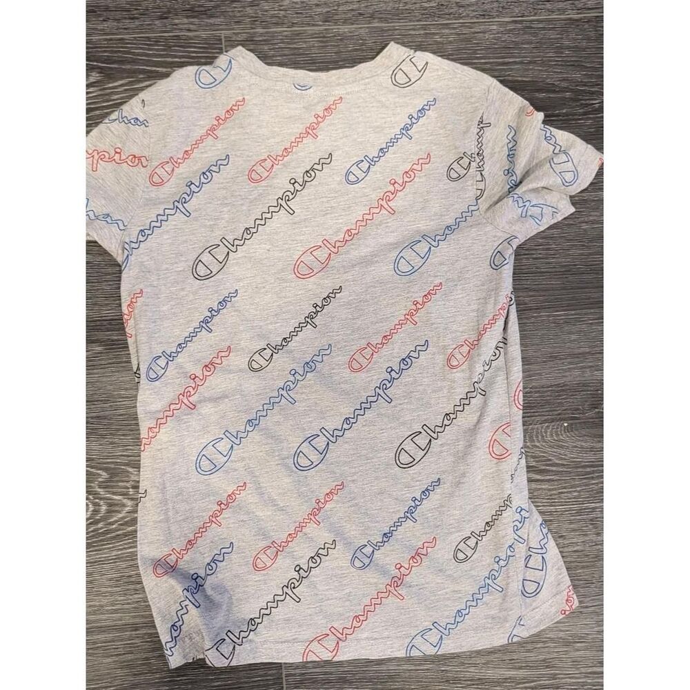 Soft gray Champion T-shirt featuring all-over...